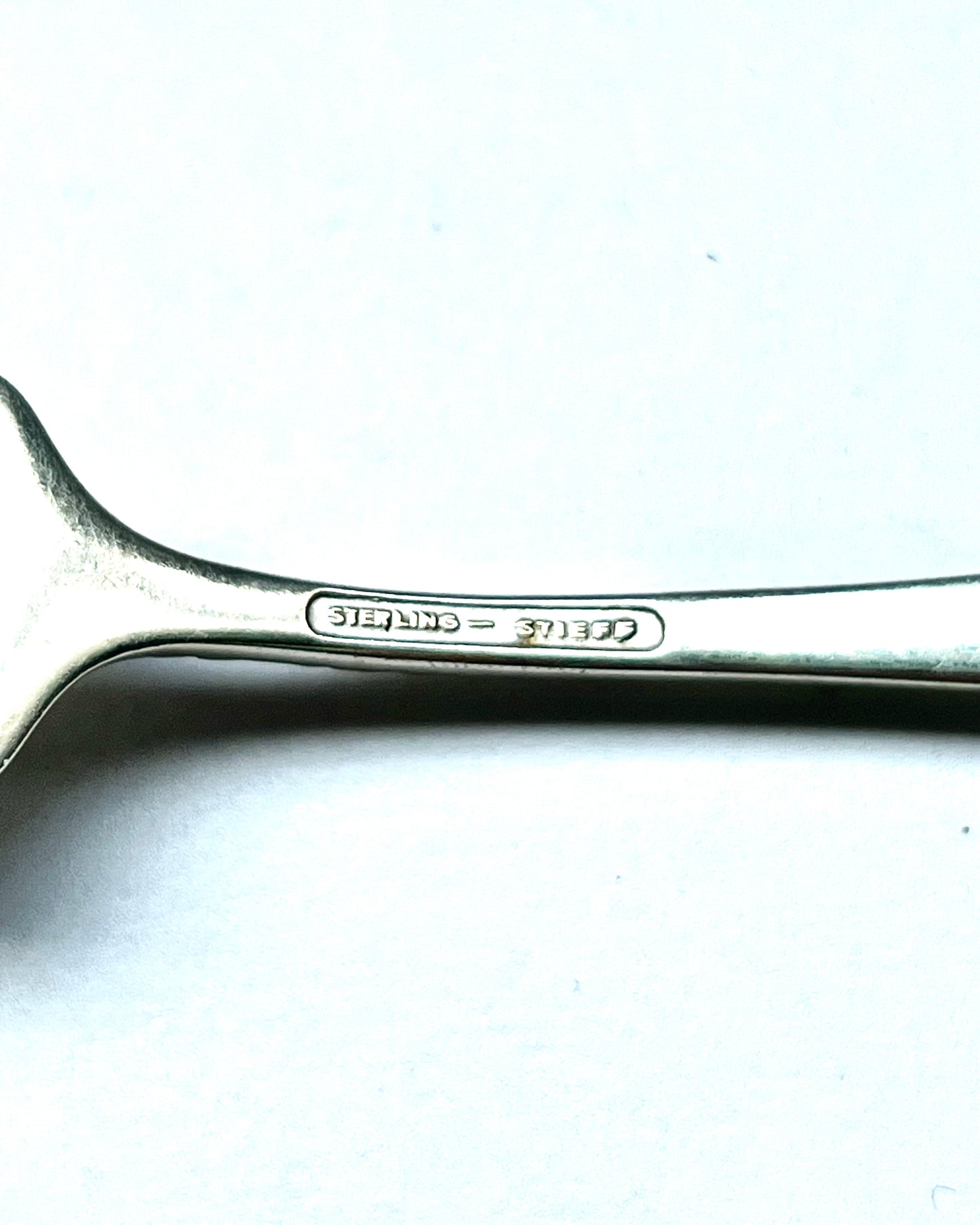 Vintage 1930s American sterling silver Rose Pattern salad fork by Stieff of Baltimore, Maryland.