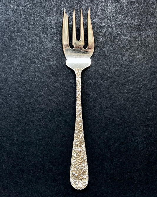 Vintage 1930s American sterling silver Rose Pattern salad fork by Stieff of Baltimore, Maryland.