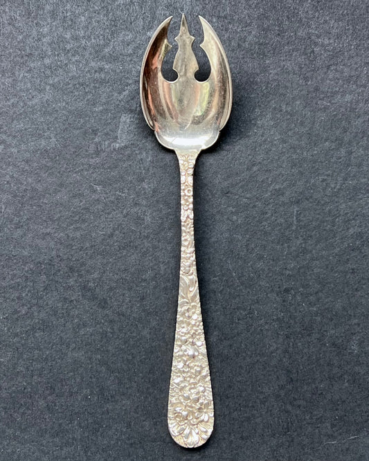 Vintage 1930s American sterling silver Rose Pattern ice cream spoons by Stieff of Baltimore, Maryland.