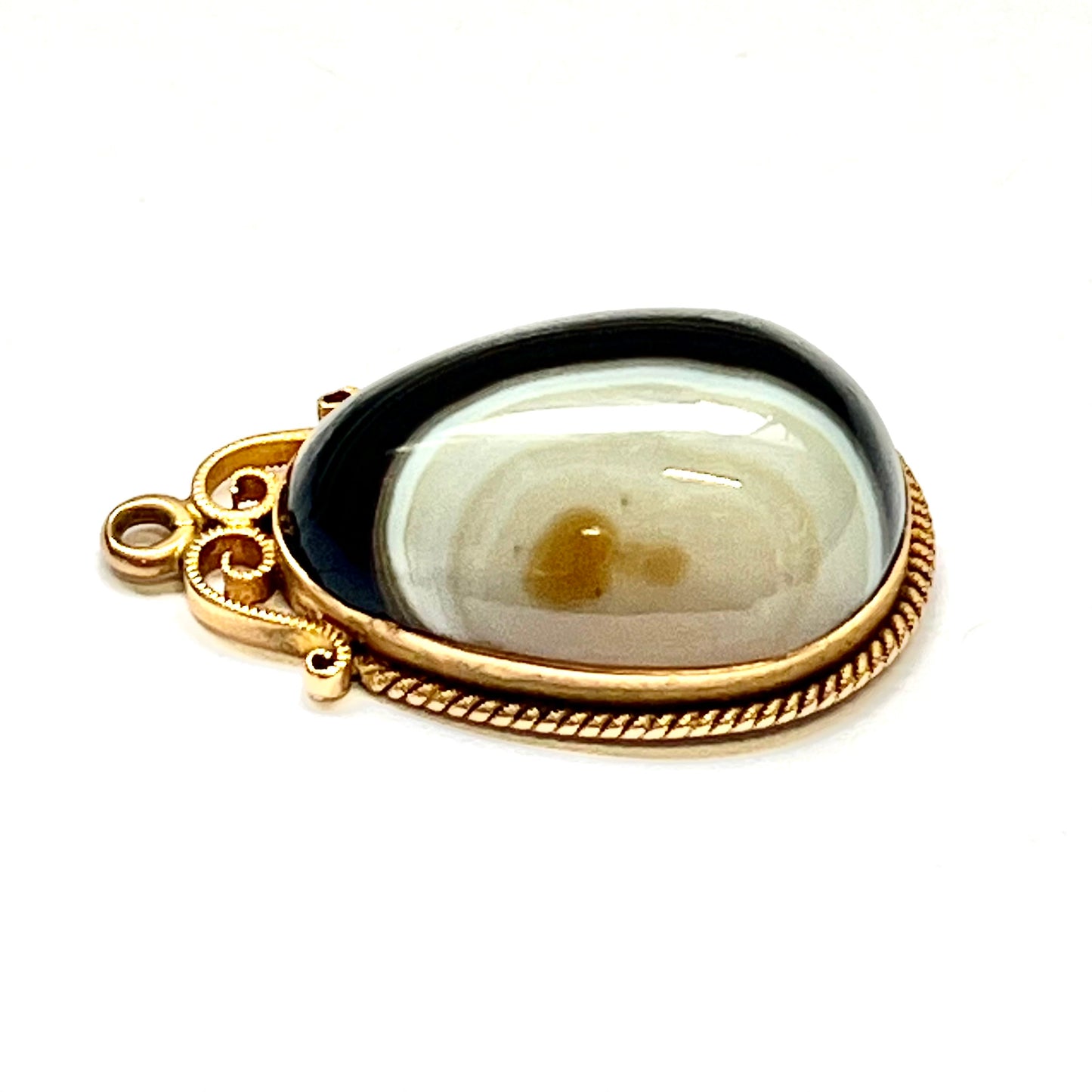 Colgante de ágata con bandas de ojo de buey, estilo colonial australiano del siglo XIX, en oro de 15 quilates.