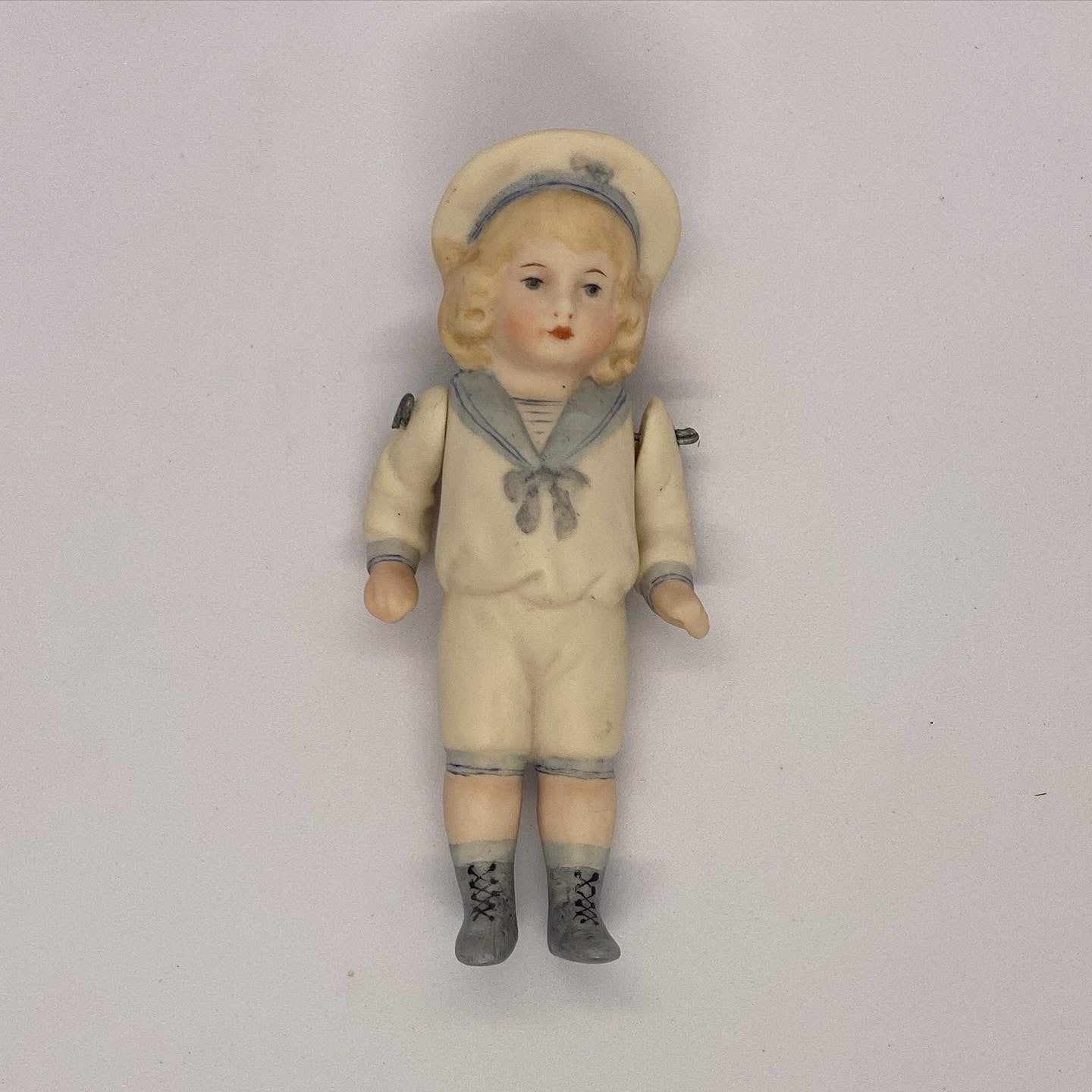 Lovely vintage Hertwig German sailor boy figurine in bisque porcelain
