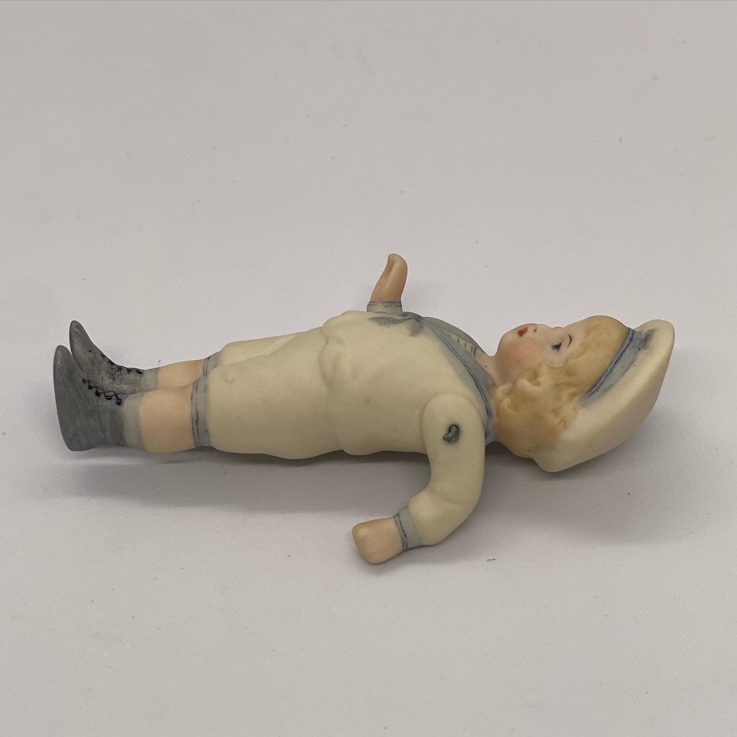 Lovely vintage Hertwig German sailor boy figurine in bisque porcelain