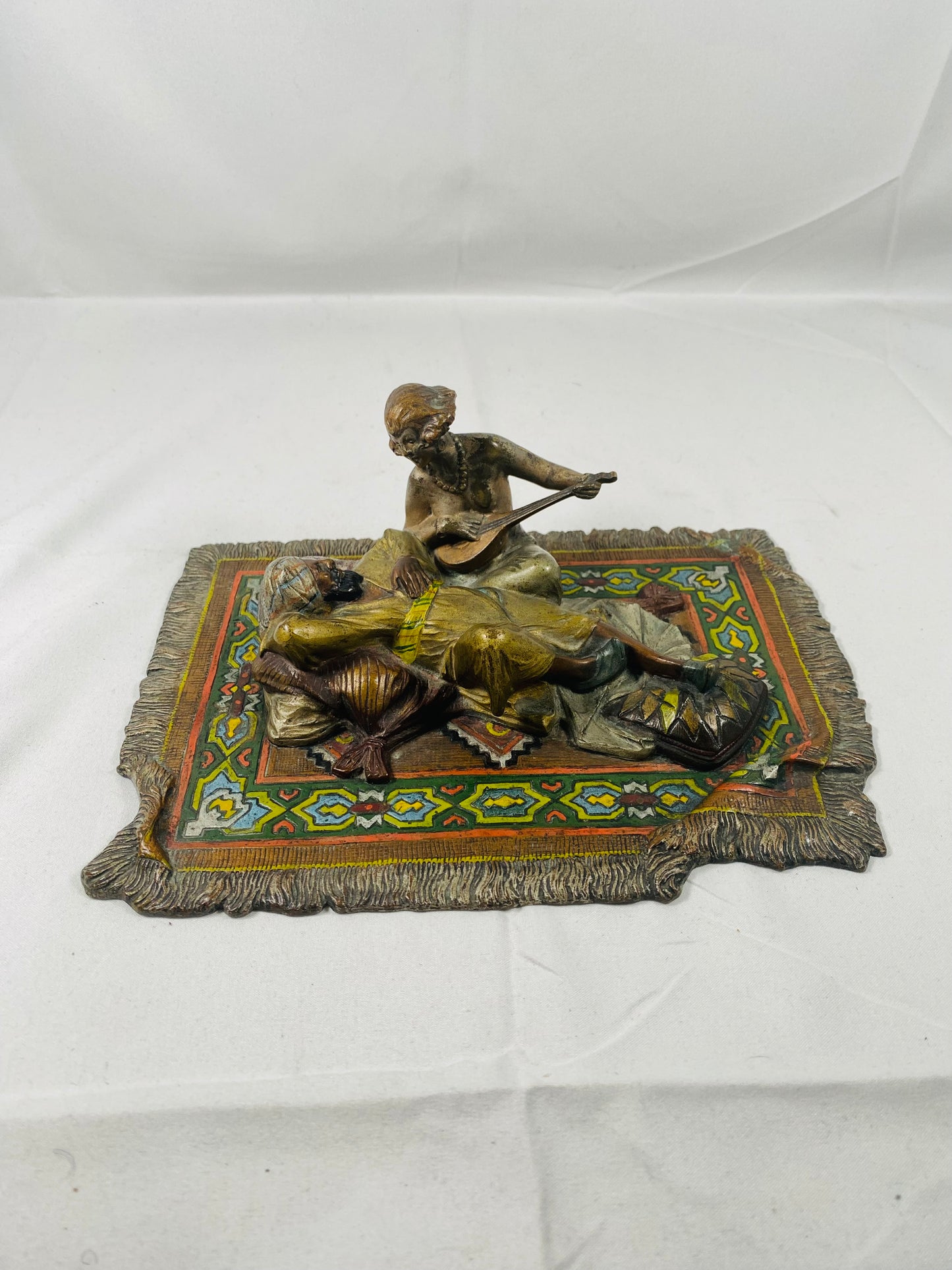Viennese Cold Painted Erotic Bronze of Man and Female Musician on Carpet, Moorish / Oriental Style c. 1910. Attributed to Franz Bergman.