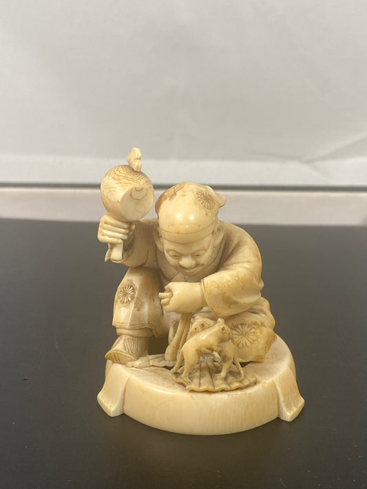 Playful Antique Tokyo School signed Japanese ivory okimono, A fan craftsman with two rats