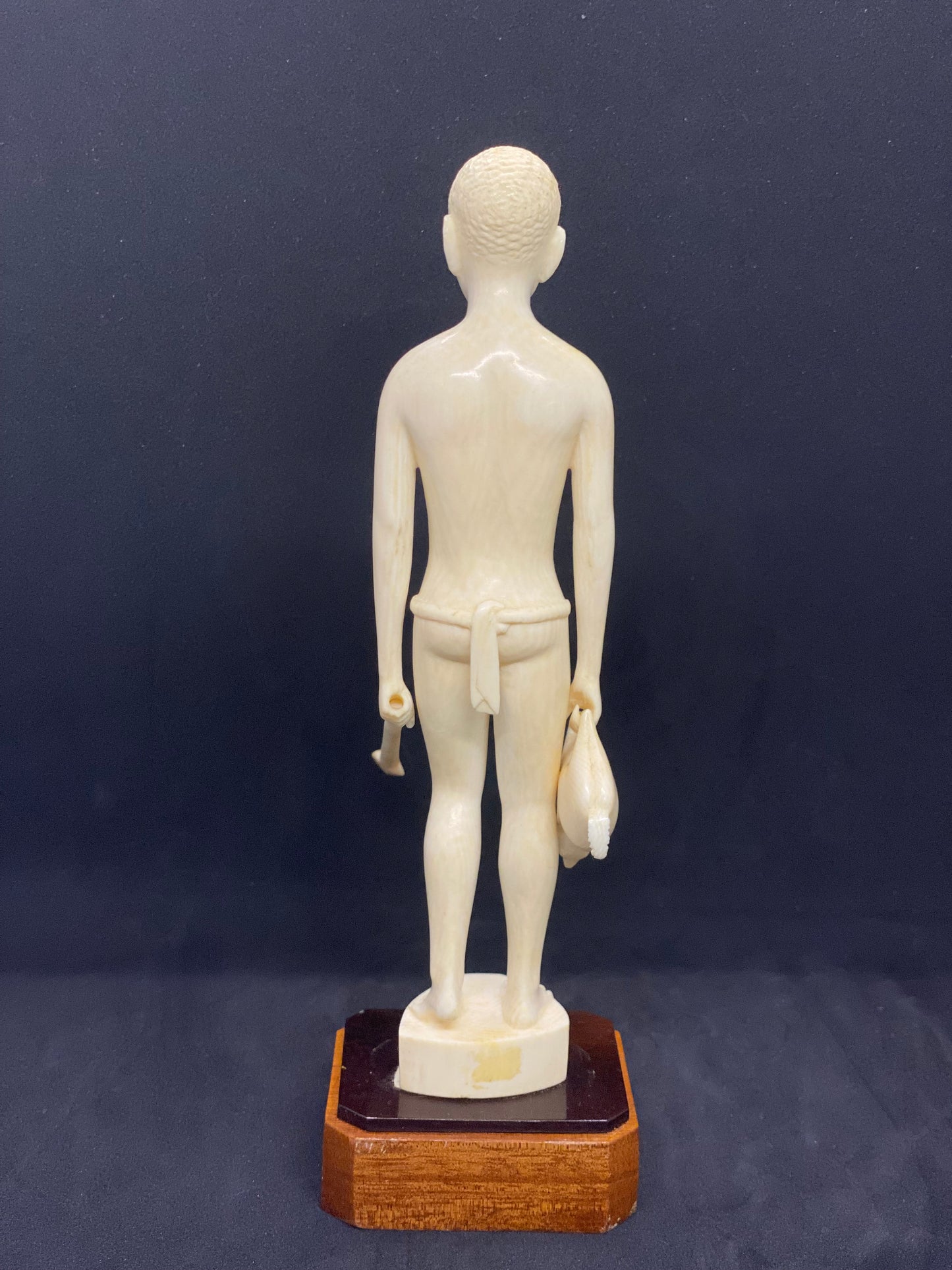 African Ivory Coast Figure of Young Hunter, early 20th century.