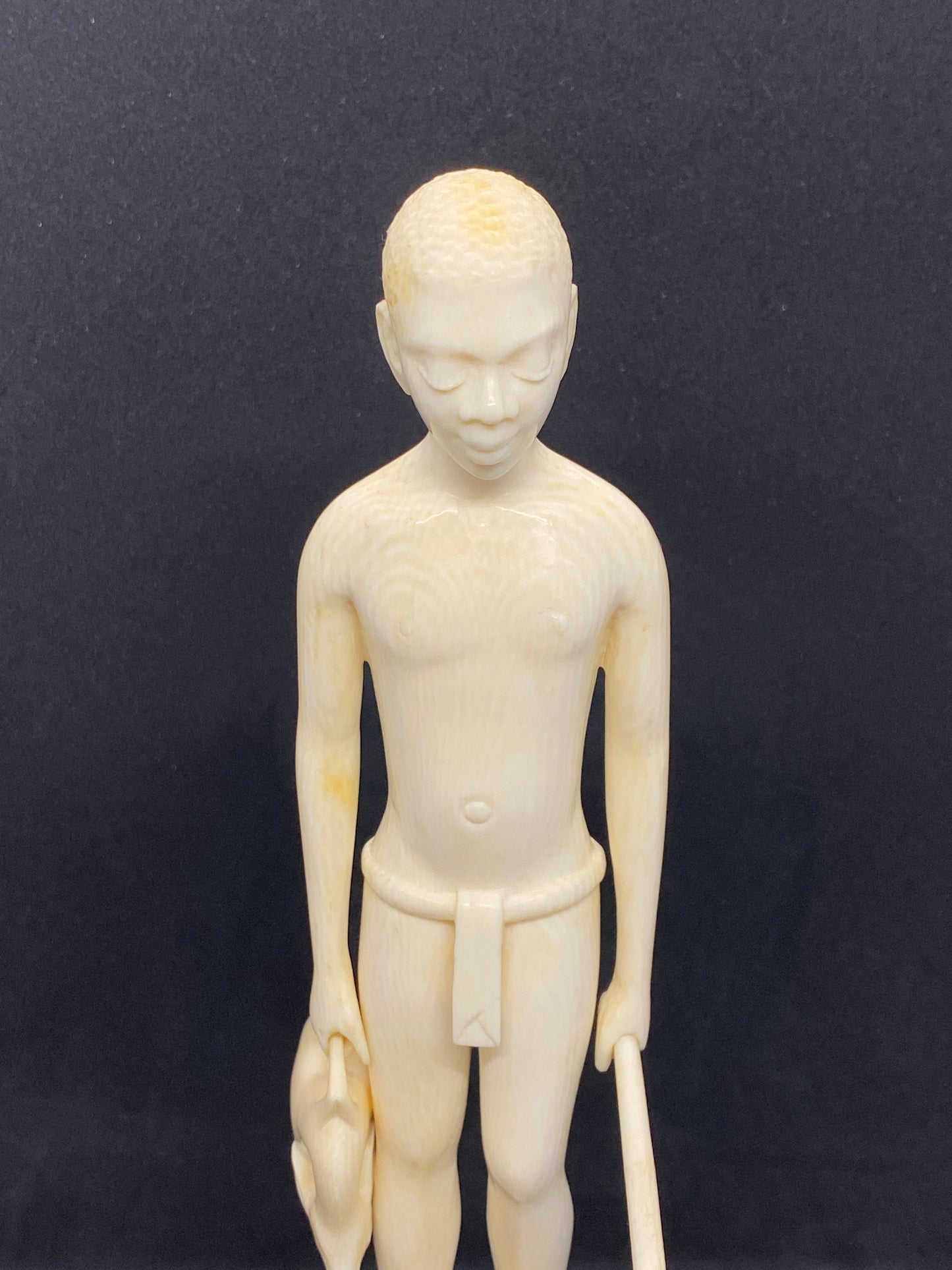 African Ivory Coast Figure of Young Hunter, early 20th century.