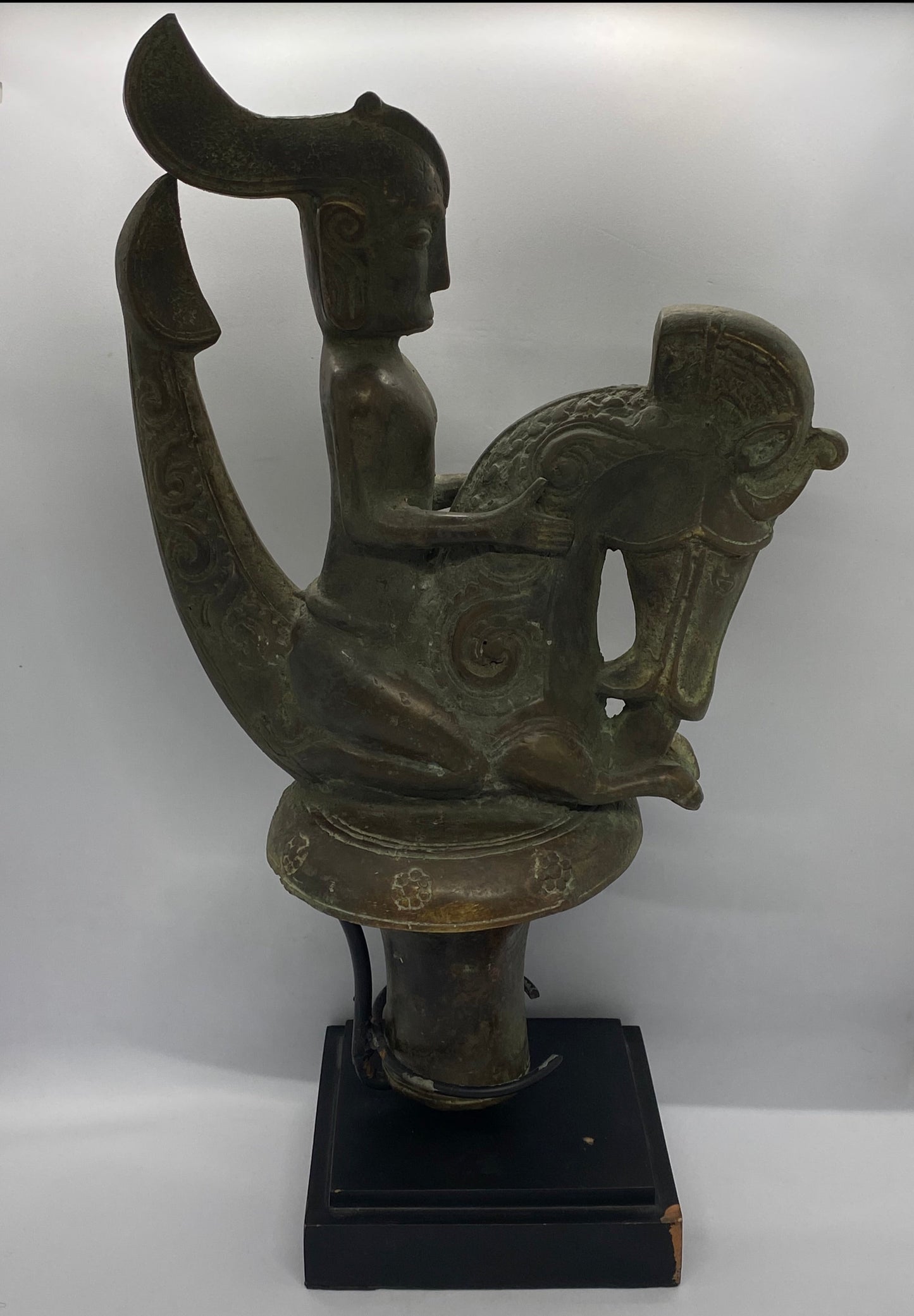 Large Indonesian Batak Bronze Stopper Depicting Rider and Singa