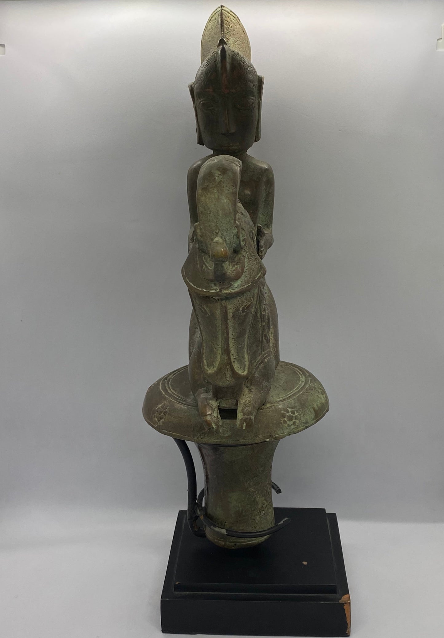 Large Indonesian Batak Bronze Stopper Depicting Rider and Singa