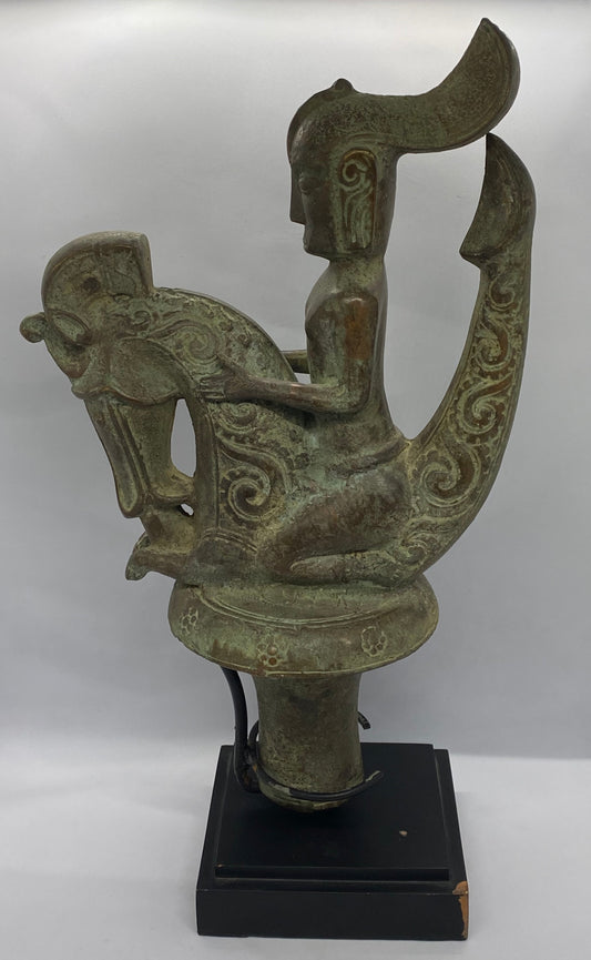 Large Indonesian Batak Bronze Stopper Depicting Rider and Singa
