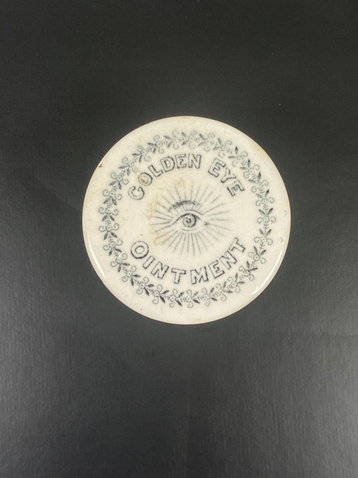 Frasco con tapa de boticario victoriano del siglo XIX, con transferencia de loza, para ungüento de ojos dorados