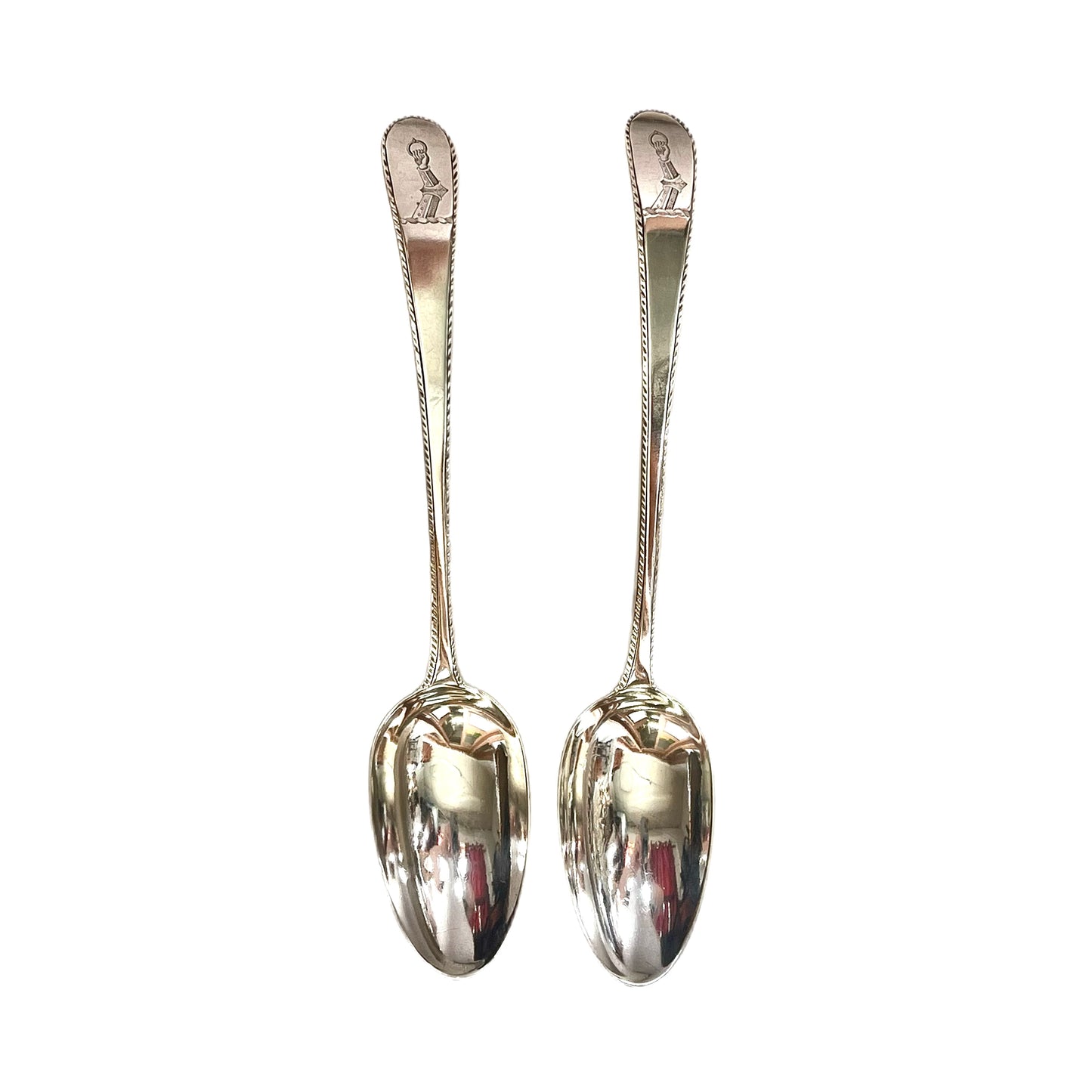 Matching pair of crested George III sterling silver serving spoons by Hester Bateman