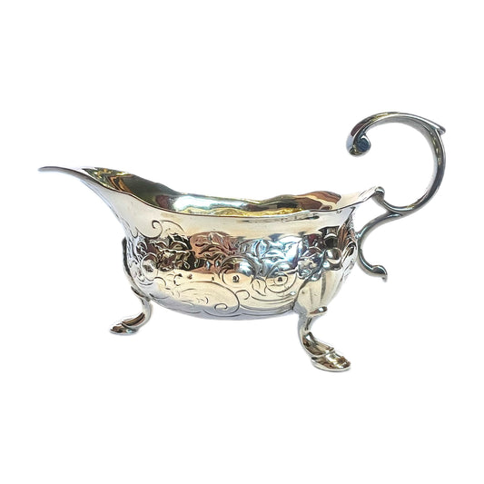 George II sterling silver creamer jug by John Pollock, 1742