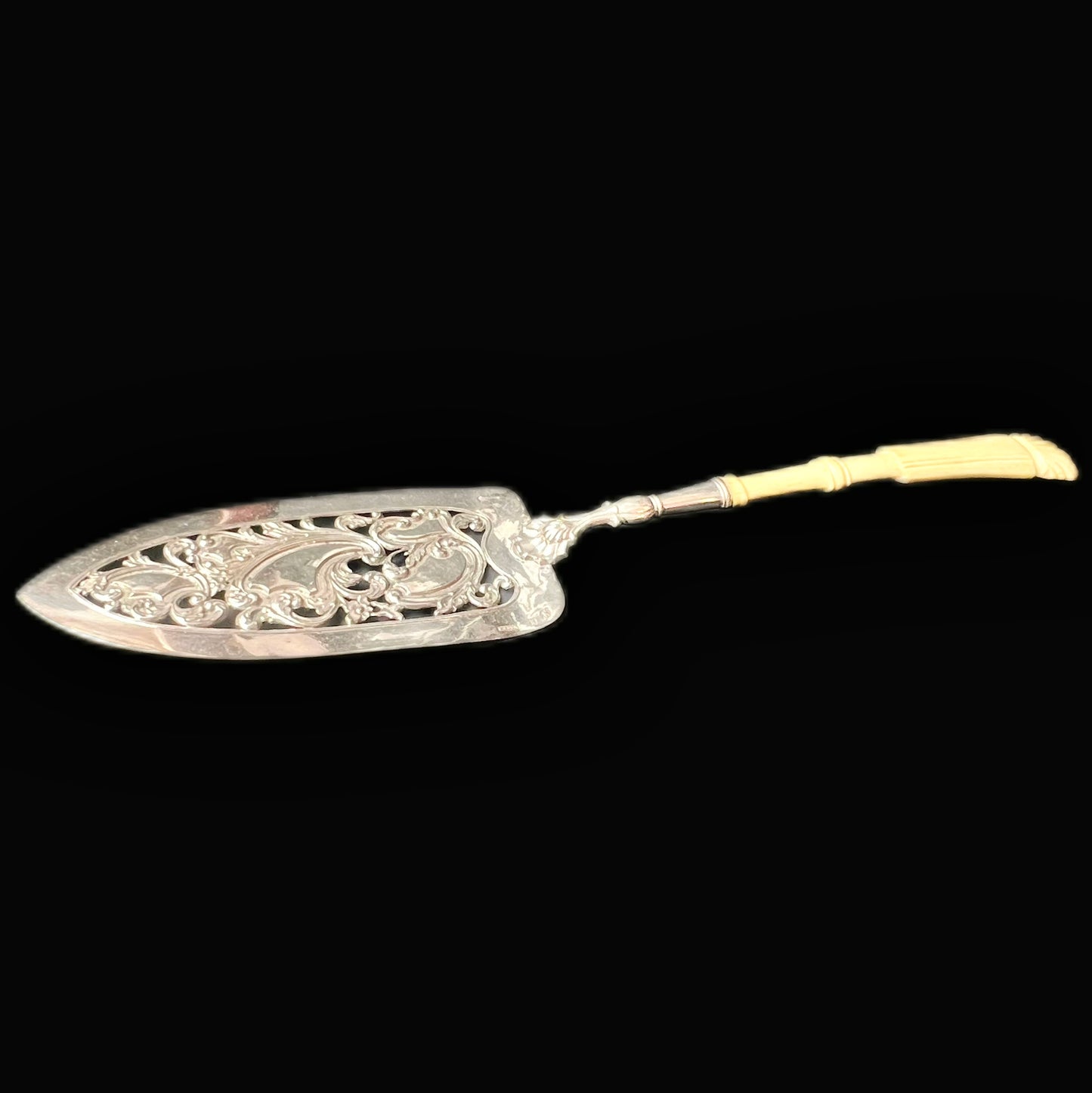 19th century silver bladed cake slice with carved bone handle