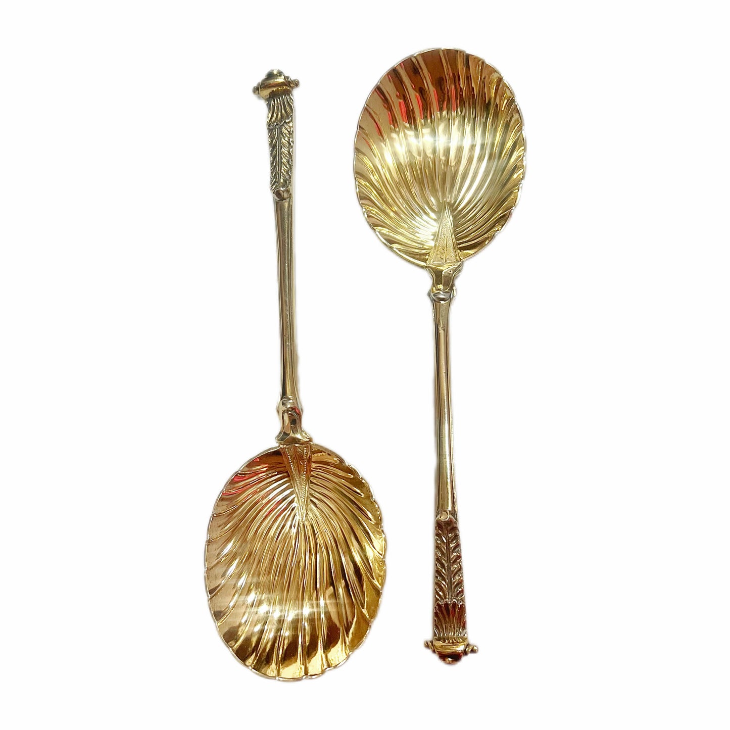 Llate Victorian serving spoons, gilt on sterling silver, Wakely & Wheeler. In original box.