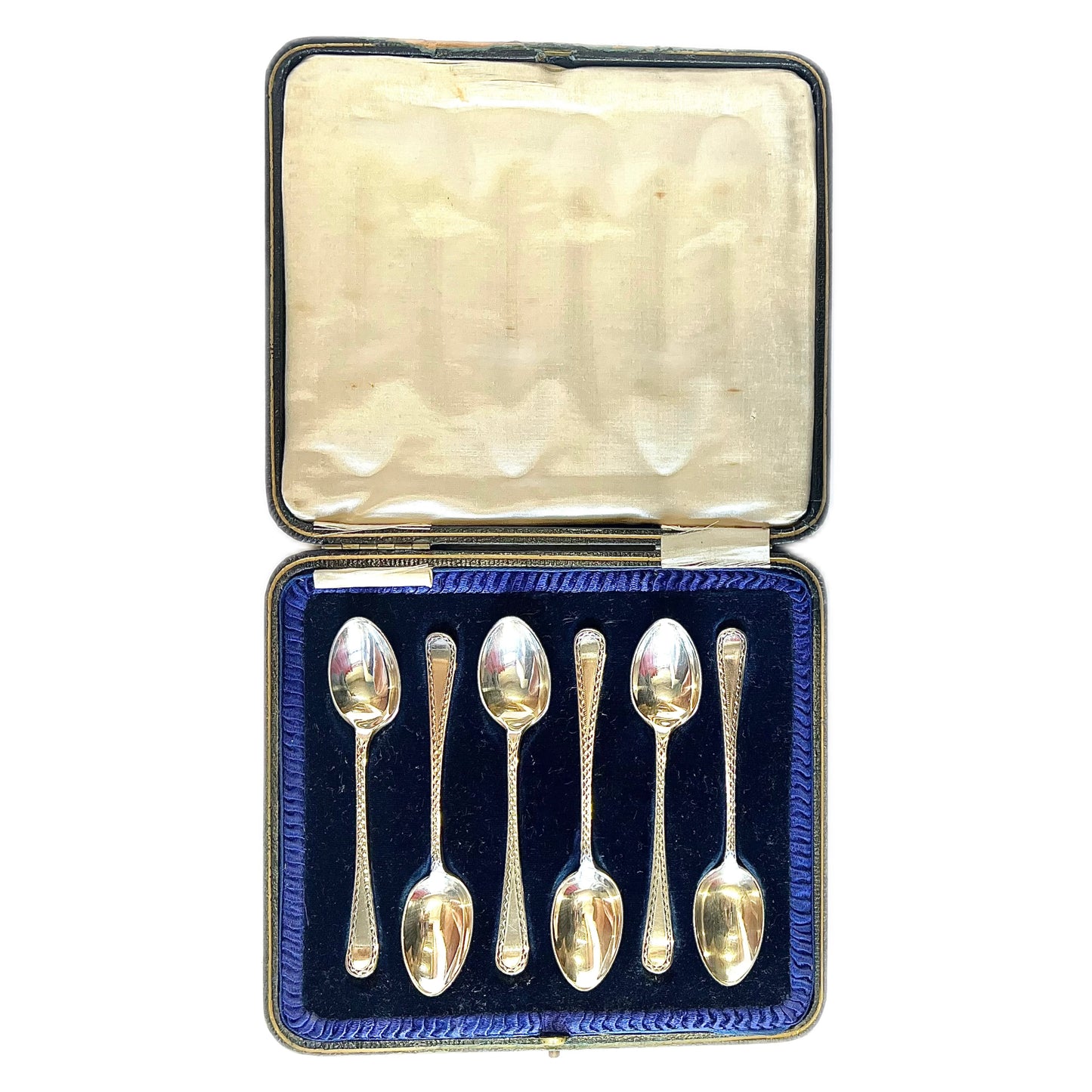 Set of six George V sterling silver coffee spoons with original case
