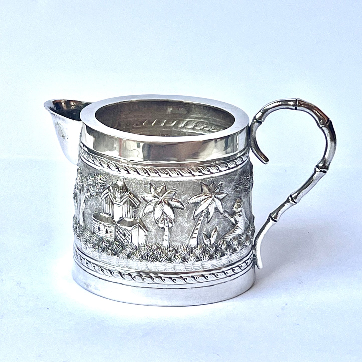 Late Victorian to Edwardian period Anglo-Indian Calcutta silver tea set comprising teapot, sugar bowl and creamer jug