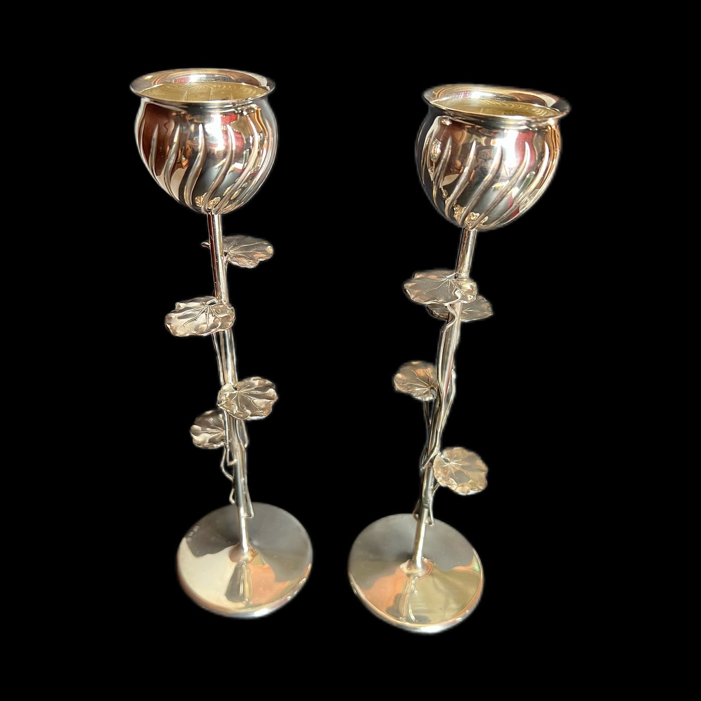 Pair of early 20th century Continental European .800 silver lotus candlesticks