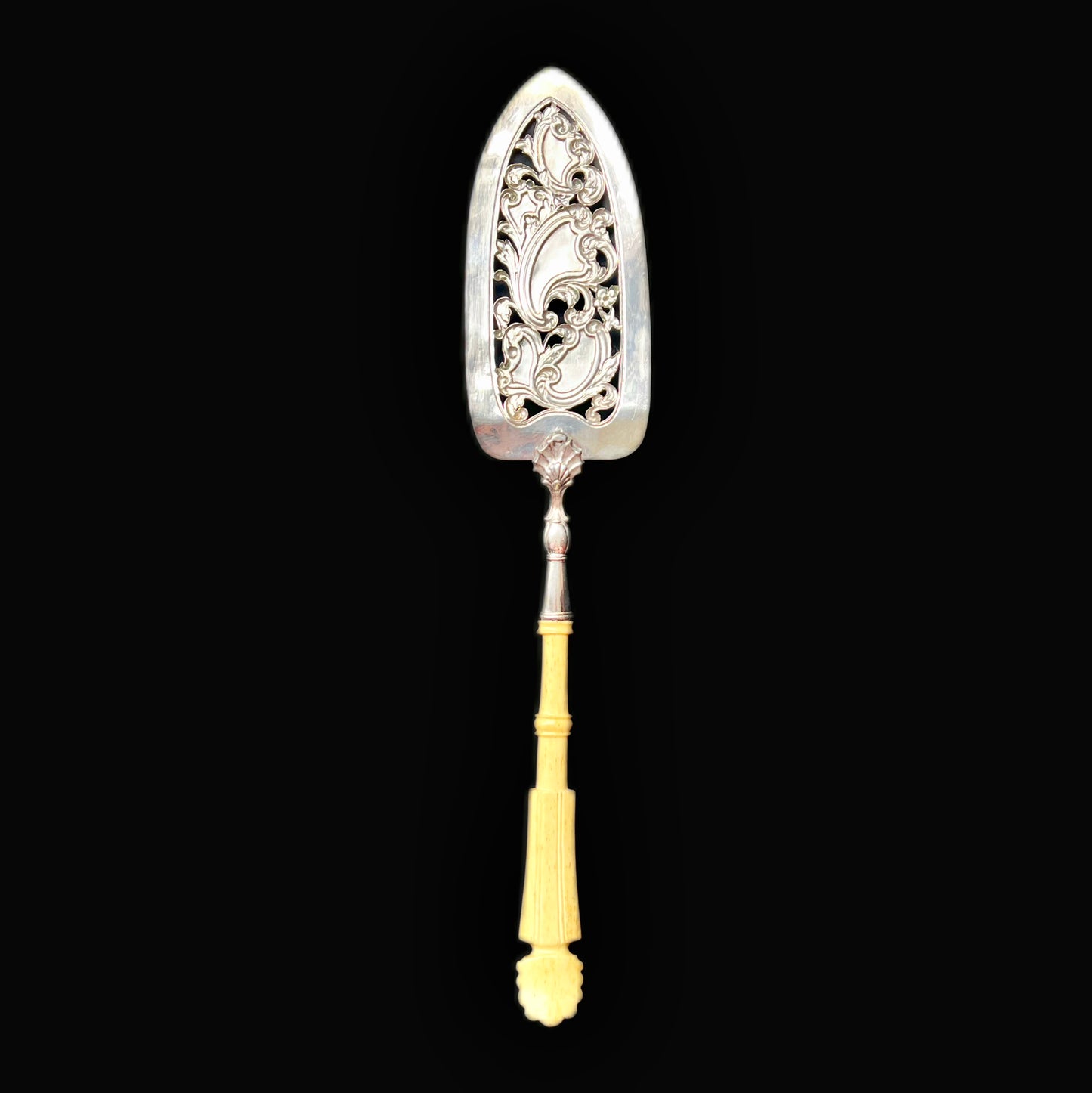 19th century silver bladed cake slice with carved bone handle