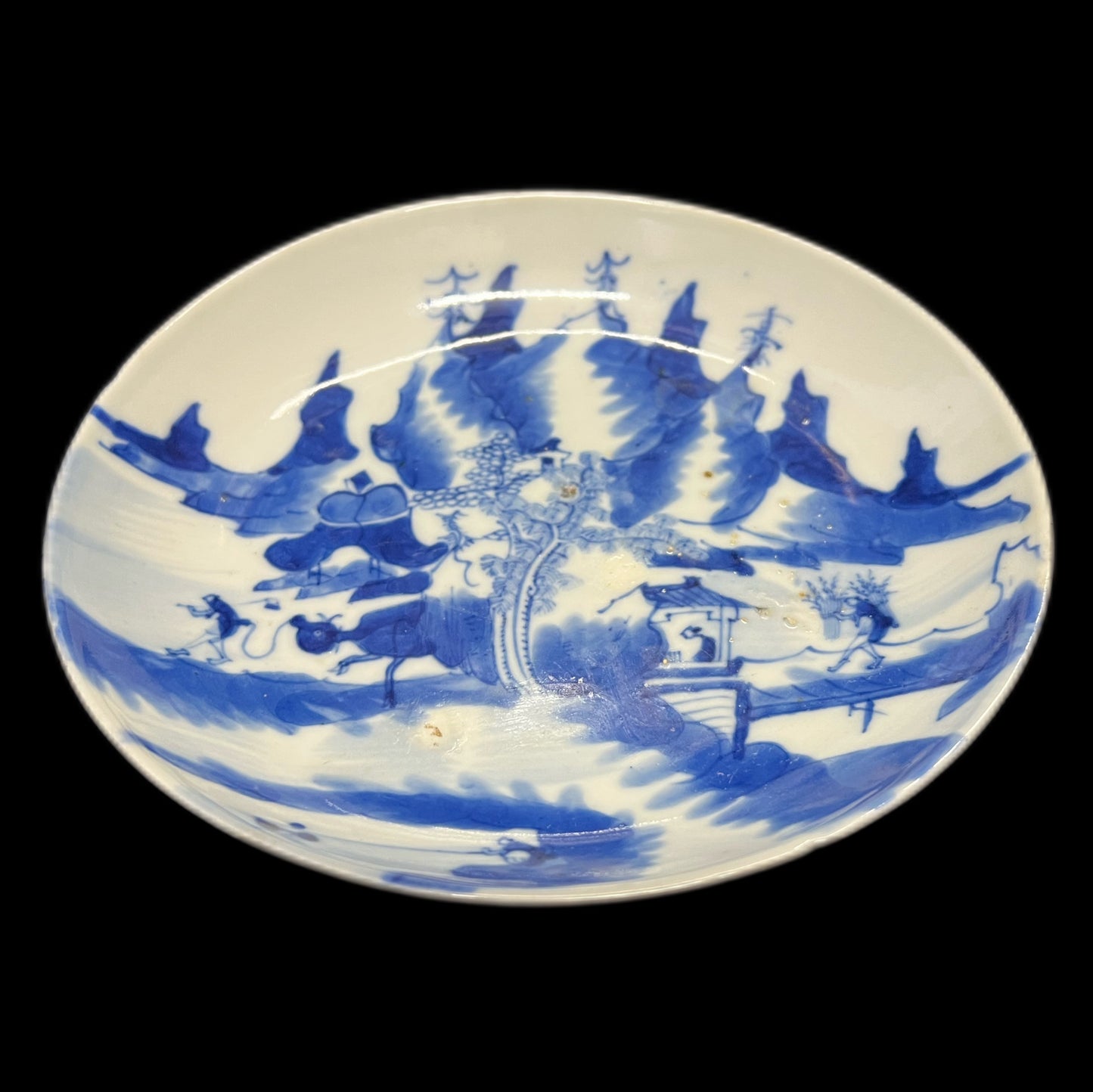 Early 18th century Kangxi period mountain landscape motif dish (restored)