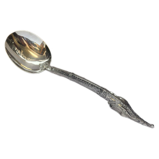 Mid to late 20th century Thai sterling silver naga-handled serving spoon