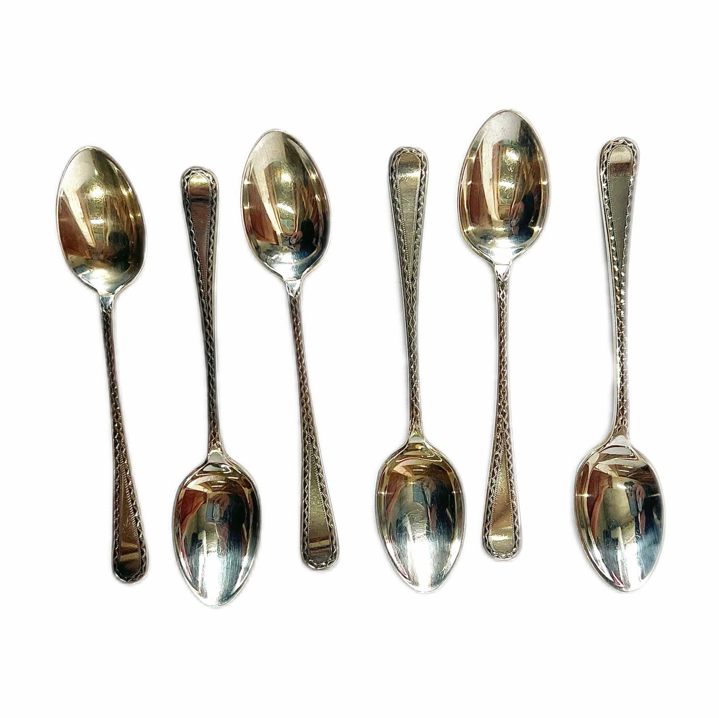 Set of six George V sterling silver coffee spoons with original case
