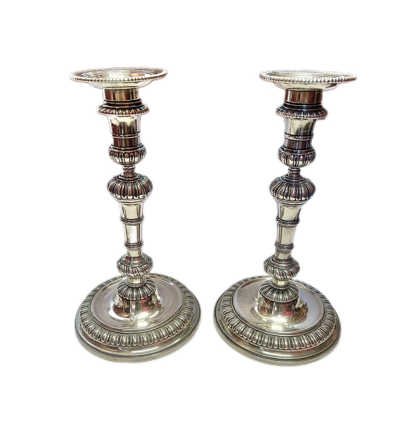 Crested pair of George II sterling silver candlesticks by Elizabeth Godfrey