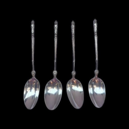 Set of four 19th century silver teaspoons by Emile Puiforcat