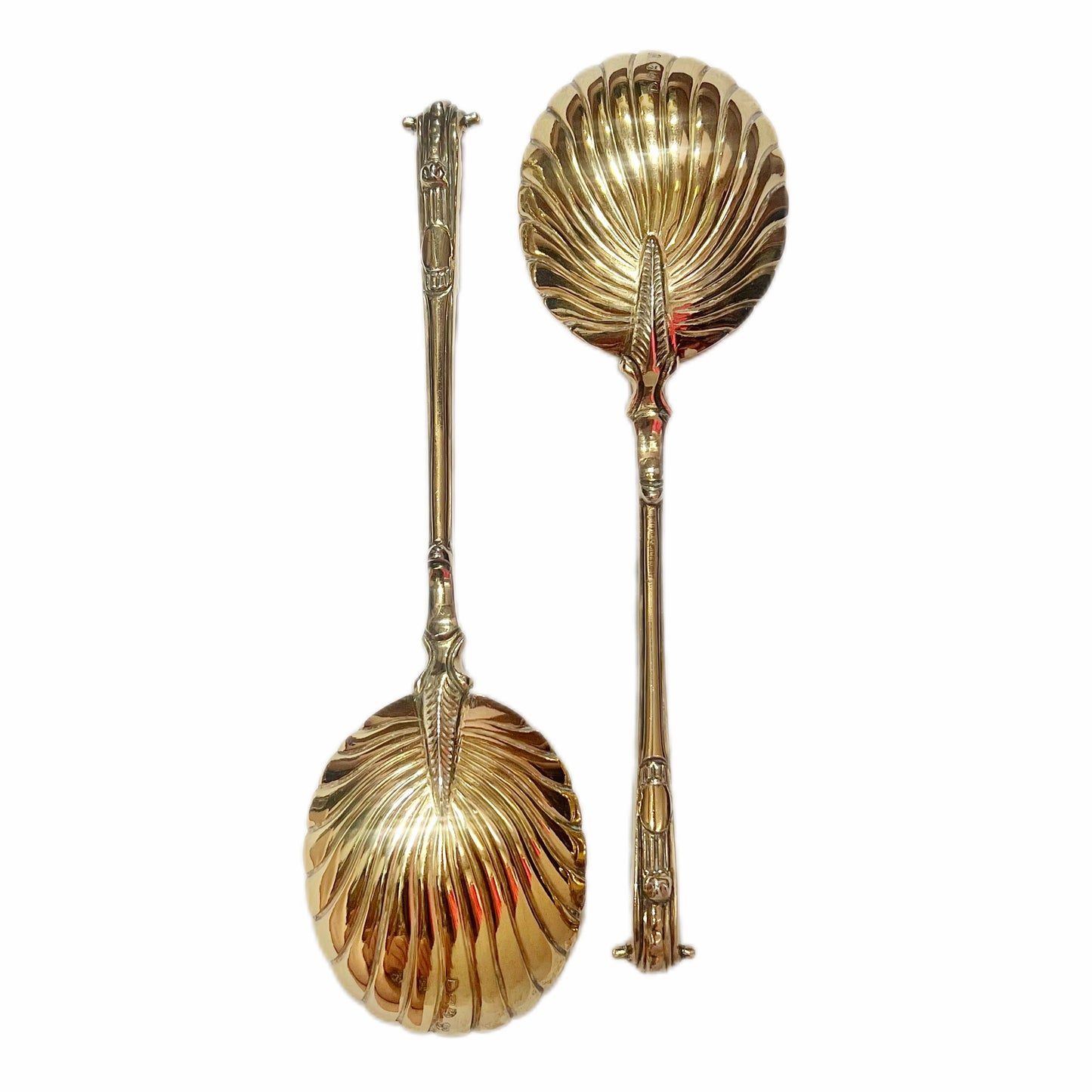 Llate Victorian serving spoons, gilt on sterling silver, Wakely & Wheeler. In original box.