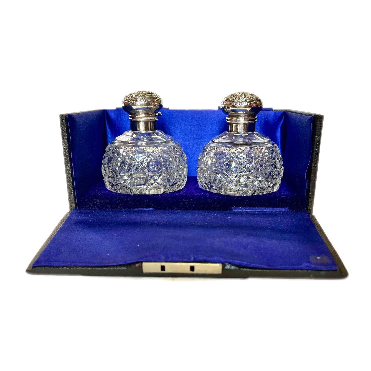 Cased set of two Edwardian sterling sliver and cut glass perfume bottles by G. &; T. Young, NZ