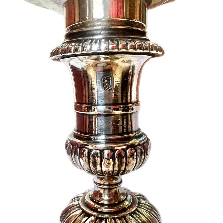 Crested pair of George II sterling silver candlesticks by Elizabeth Godfrey