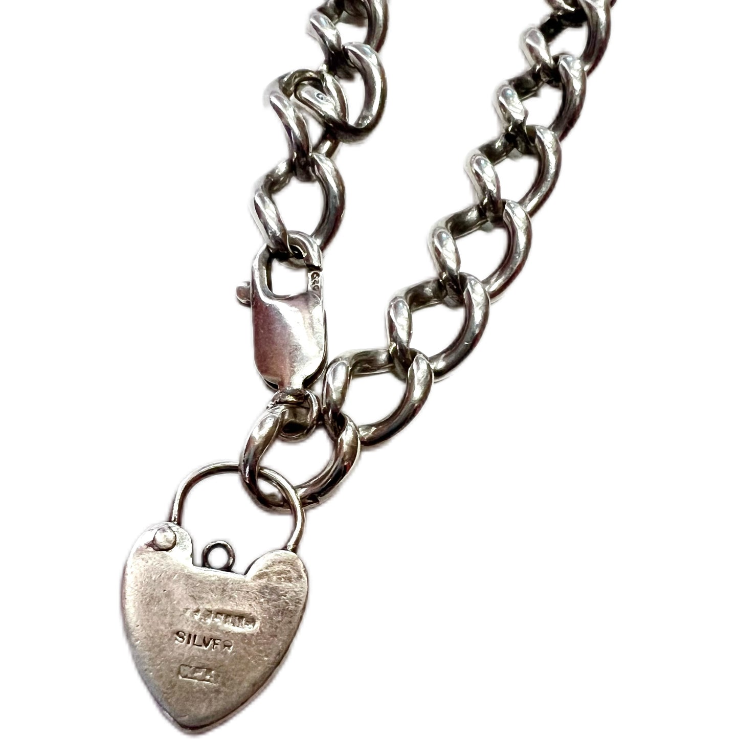 Elegant English sterling silver bracelet with W.J. Sanders heart-shaped padlock