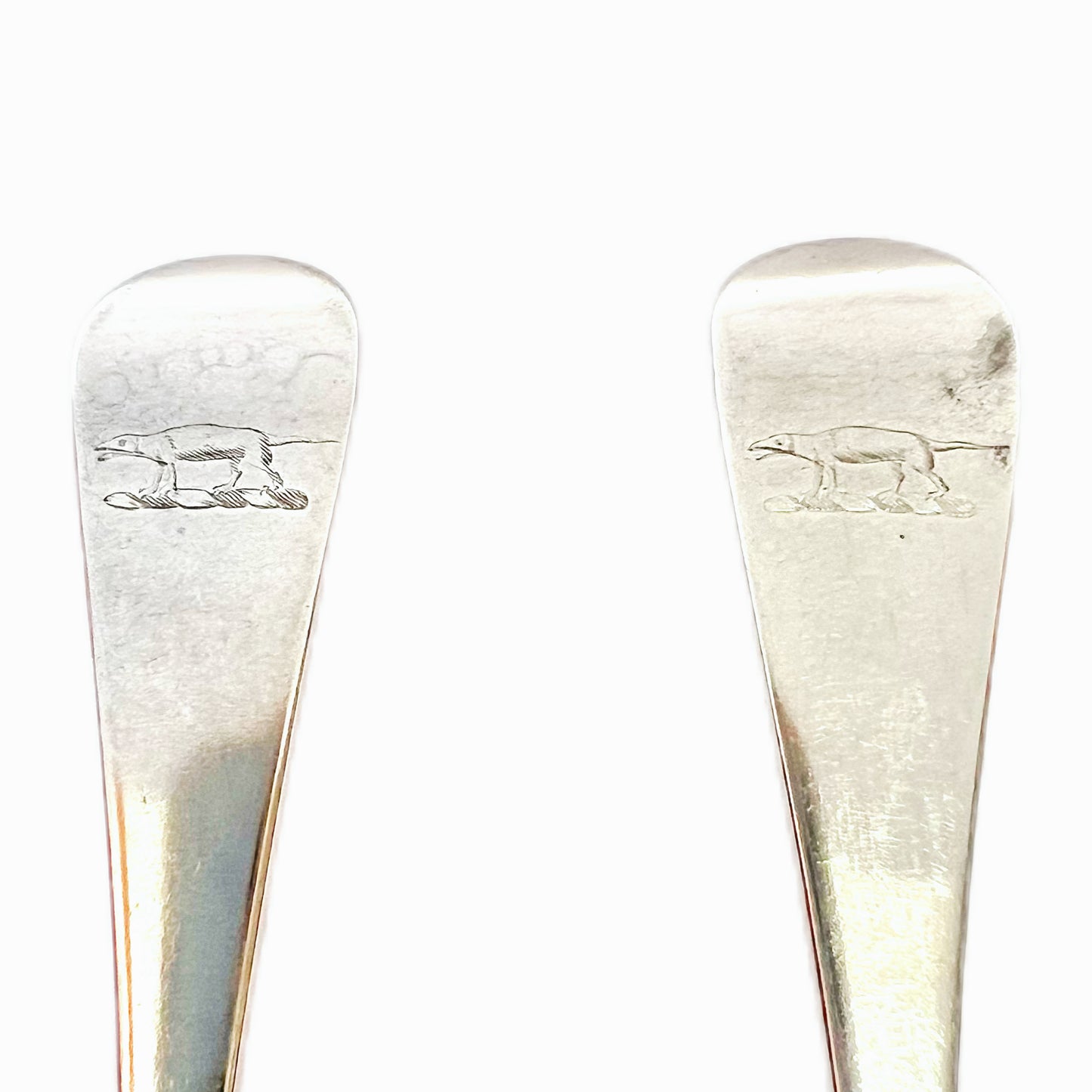 Pair of antique George II crested sterling silver tablespoons