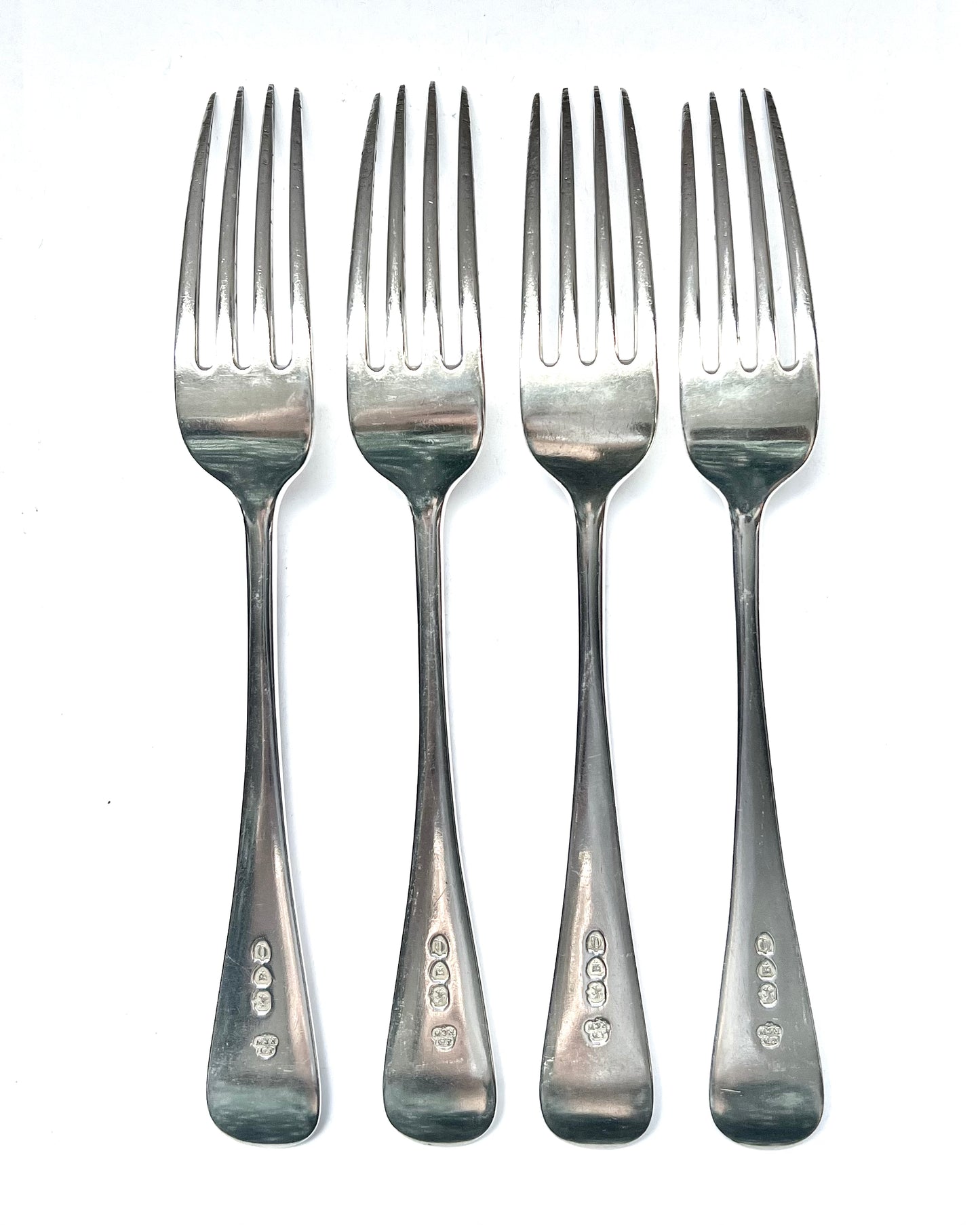 Set of 4 Late Victorian crested sterling silver table forks, London, 1891, Wakely & Wheeler