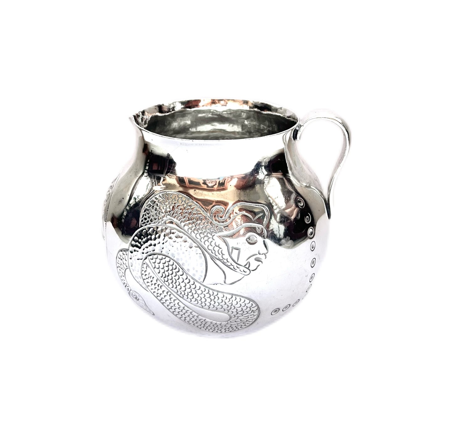 Midcentury Mexican sterling silver pitcher with varying Aztec motifs