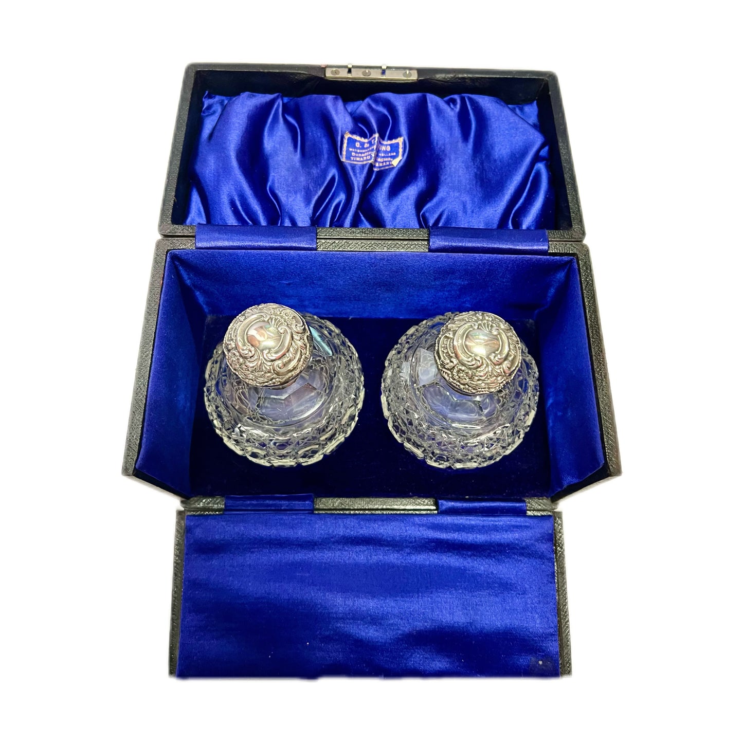 Cased set of two Edwardian sterling sliver and cut glass perfume bottles by G. &; T. Young, NZ
