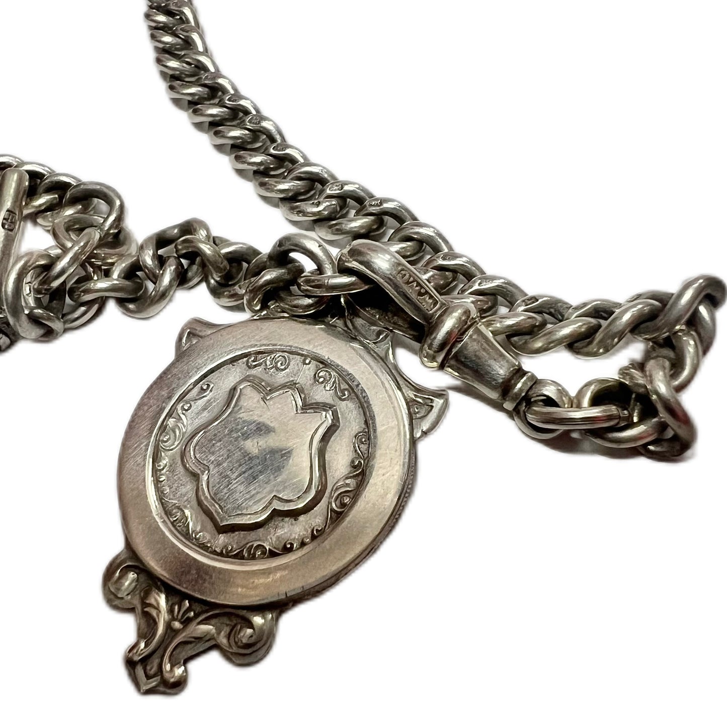 Late Victorian sterling silver Albert chain with associated dog clip and later shield fob