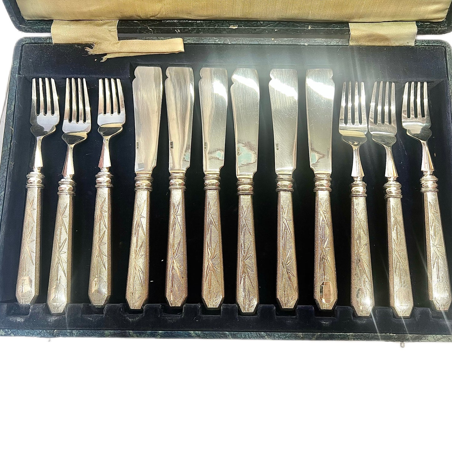 Near antique 12 piece set of Chinese export silver fish eaters, Shanghai Municipal Police Supt. Lovell's estate