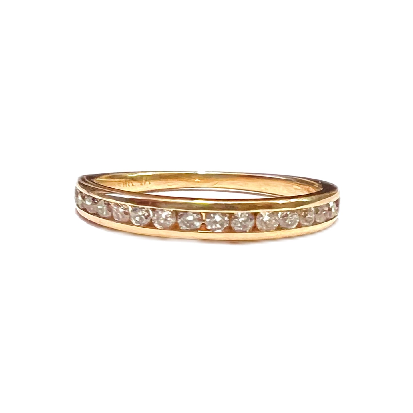 14 carat gold and diamond channel set half eternity band