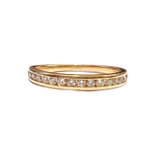 14 carat gold and diamond channel set half eternity band