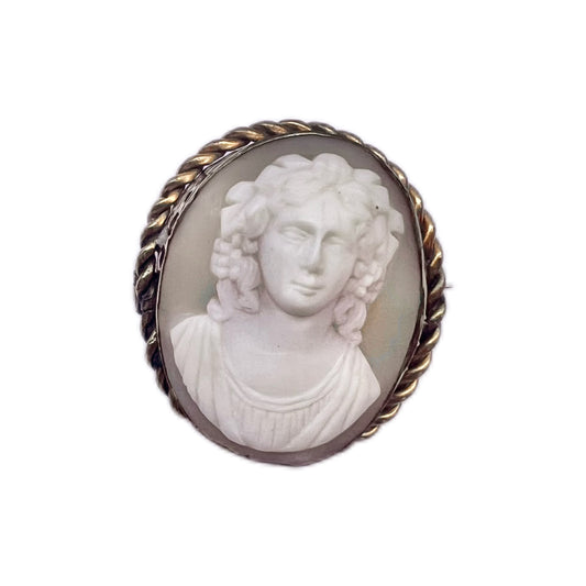 Antique sardonyx shell cameo brooch of a front-facing lady