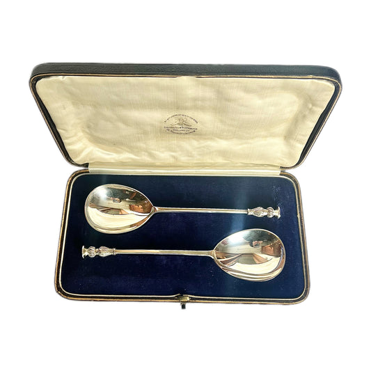 Pair of George V sterling silver serving spoons in original case
