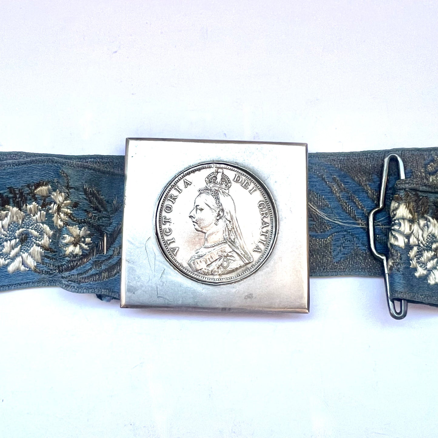 Antique Colonial Australian embroidered belt with sterling silver buckle featuring 1887 double florin