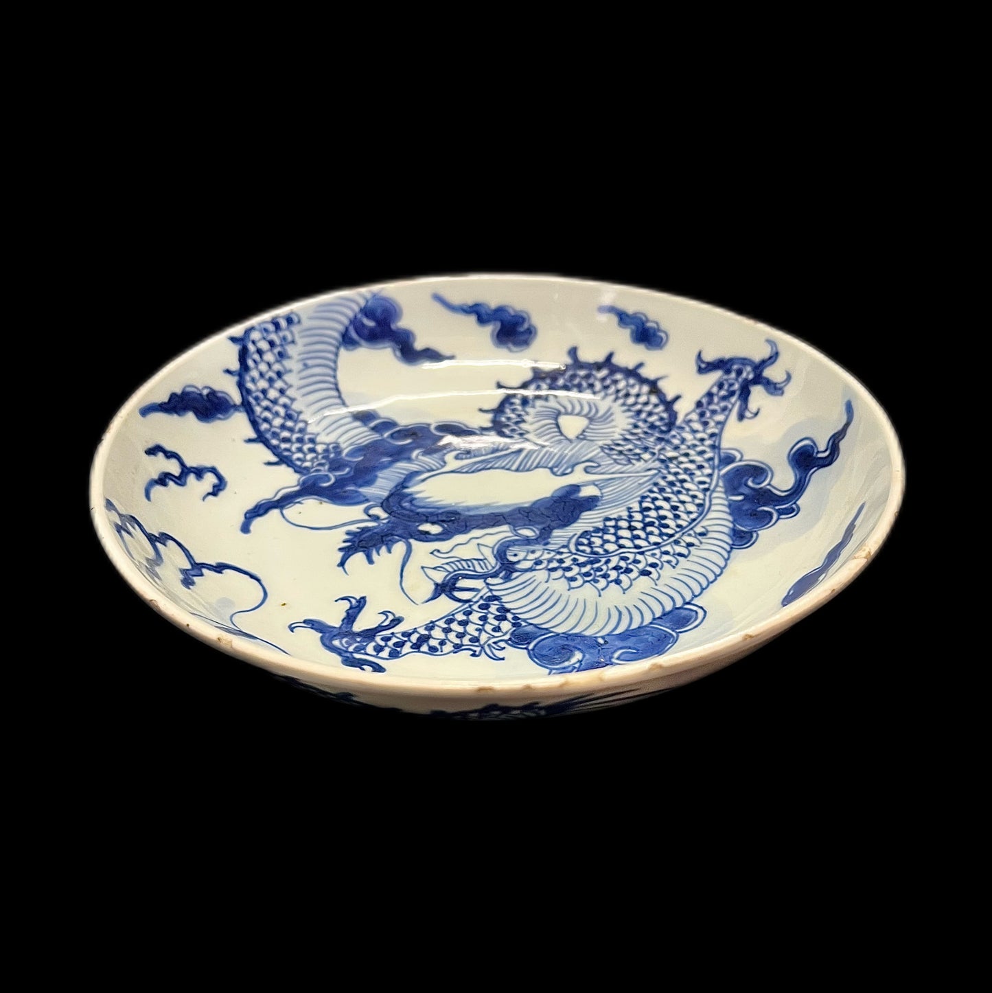 Antique 18th century Kangxi period 4-clawed dragon amongst clouds dish