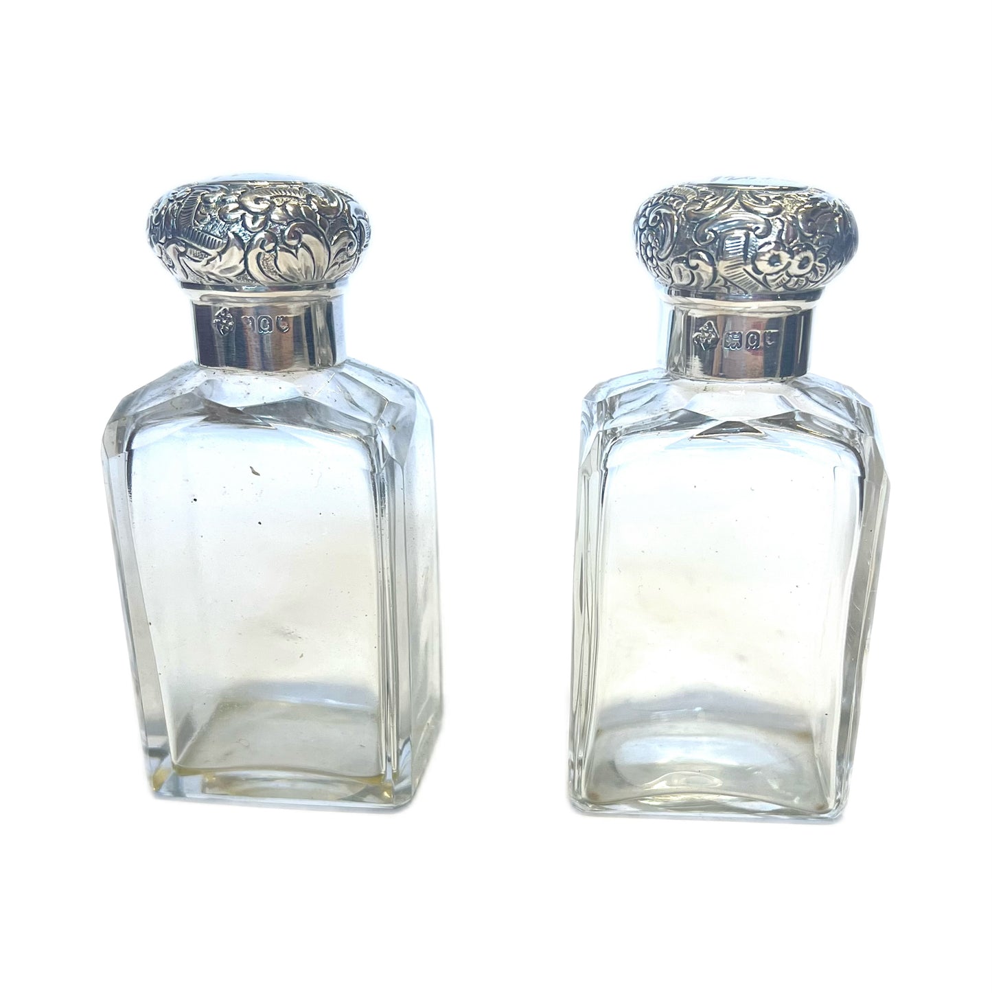 Pair of antique Victorian sterling silver and cut glass scent/toiletry bottles