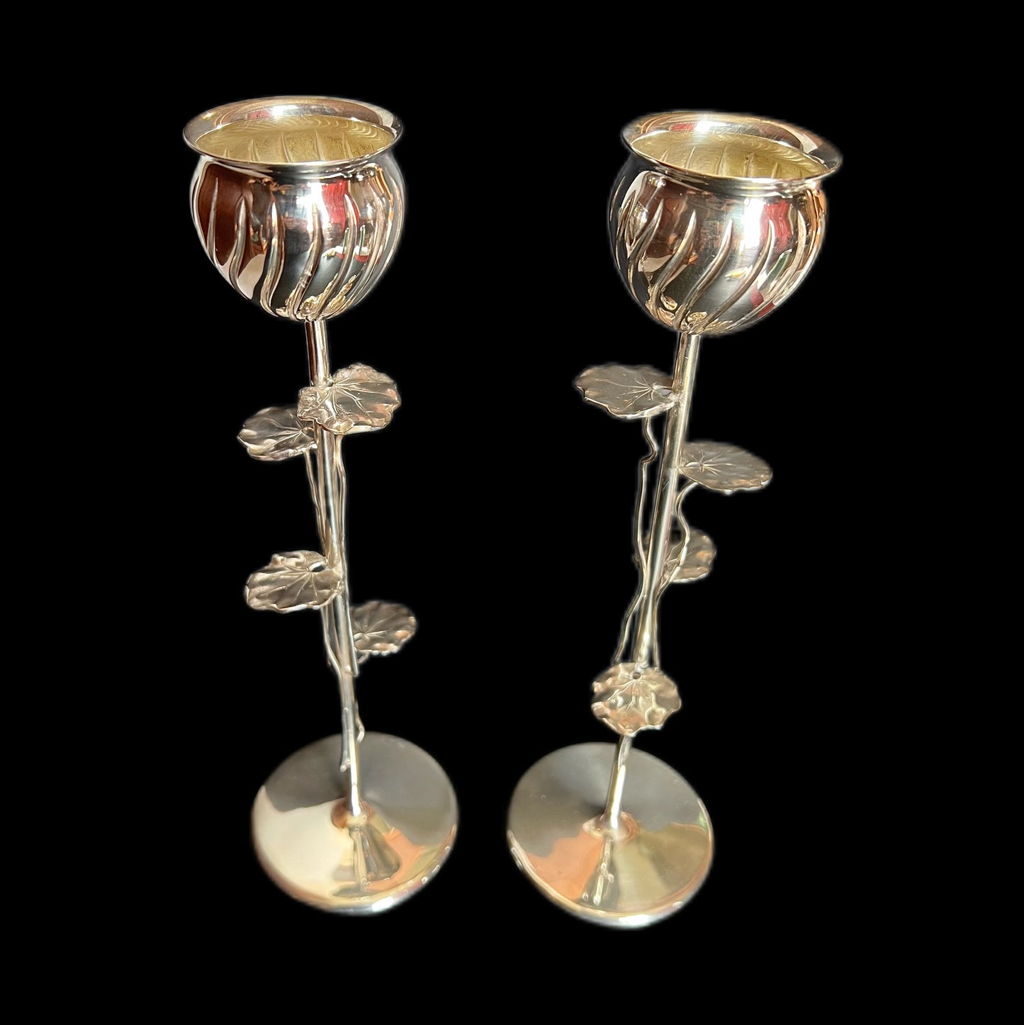 Pair of early 20th century Continental European .800 silver lotus candlesticks