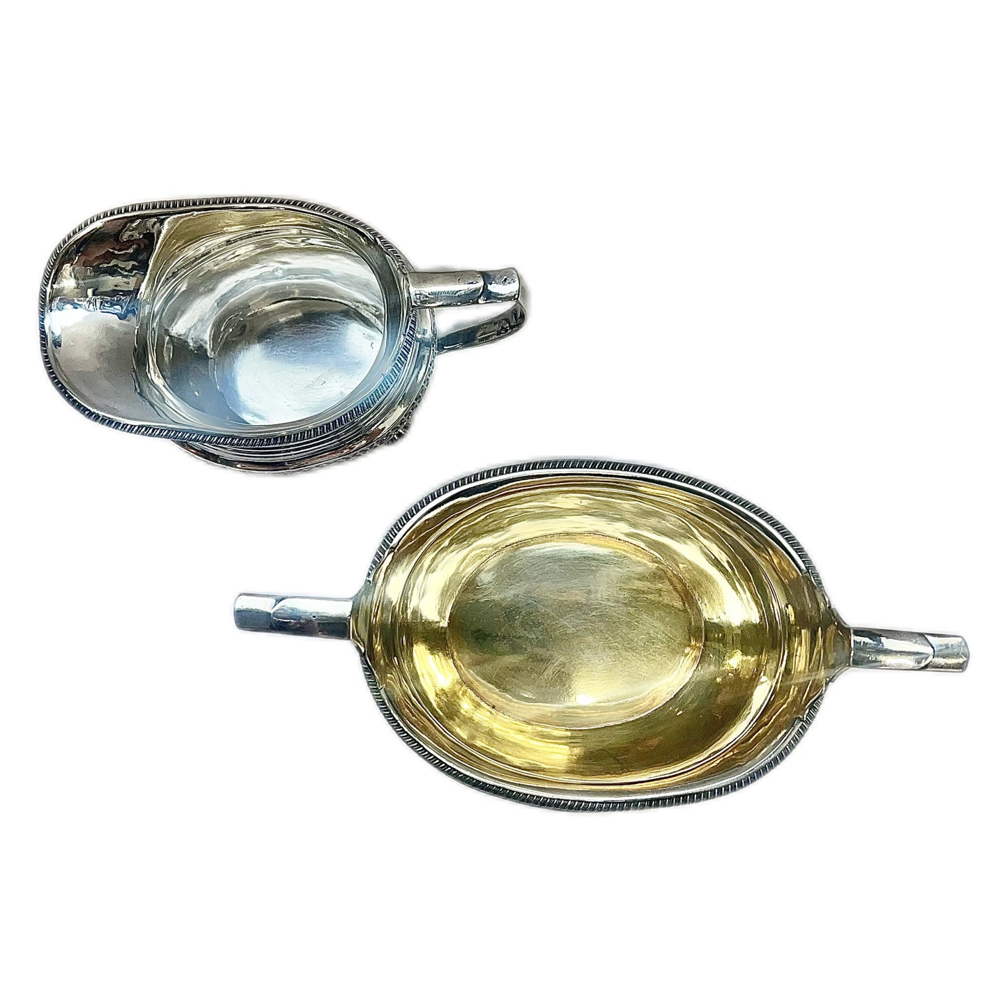 Crested George III sterling silver creamer jug and sugar bowl set