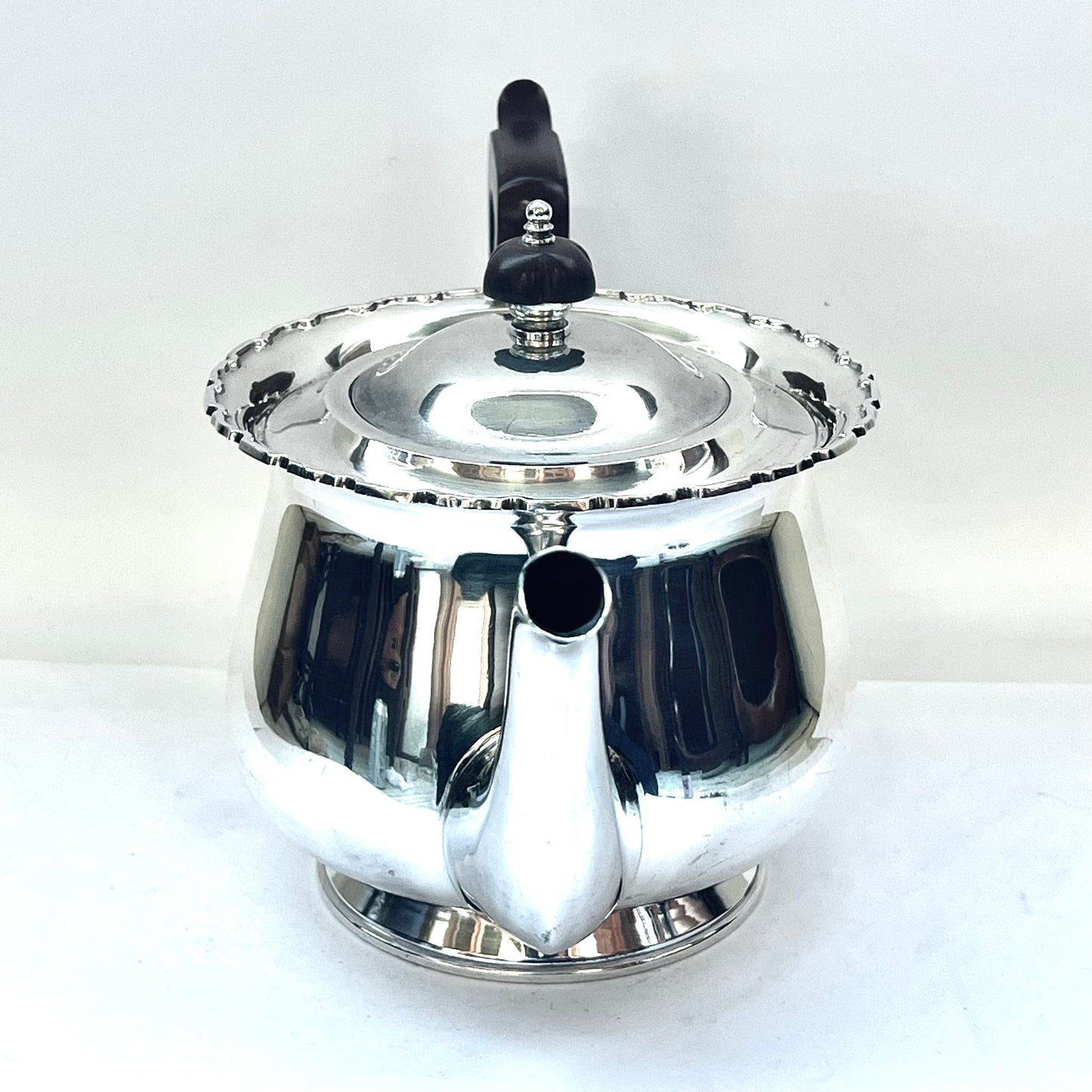 1930s Australian W.J. Sanders sterling silver teapot with Art Deco finial and handles, likely bakelite