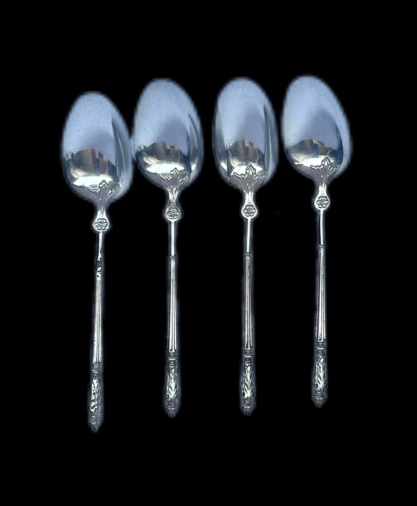 Set of four 19th century silver teaspoons by Emile Puiforcat