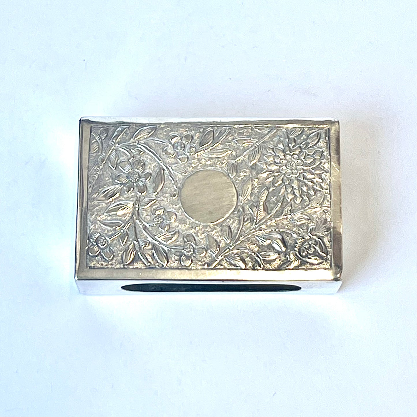 Antique Chinese export silver matchbox with floral motifs