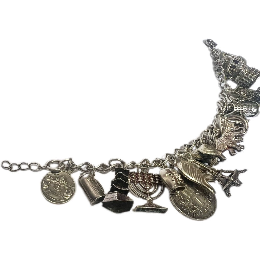 Vintage sterling silver bracelet with 20 attached silver charms